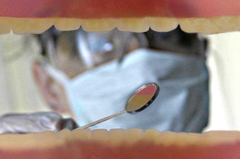 A blurry shot of a dentist.