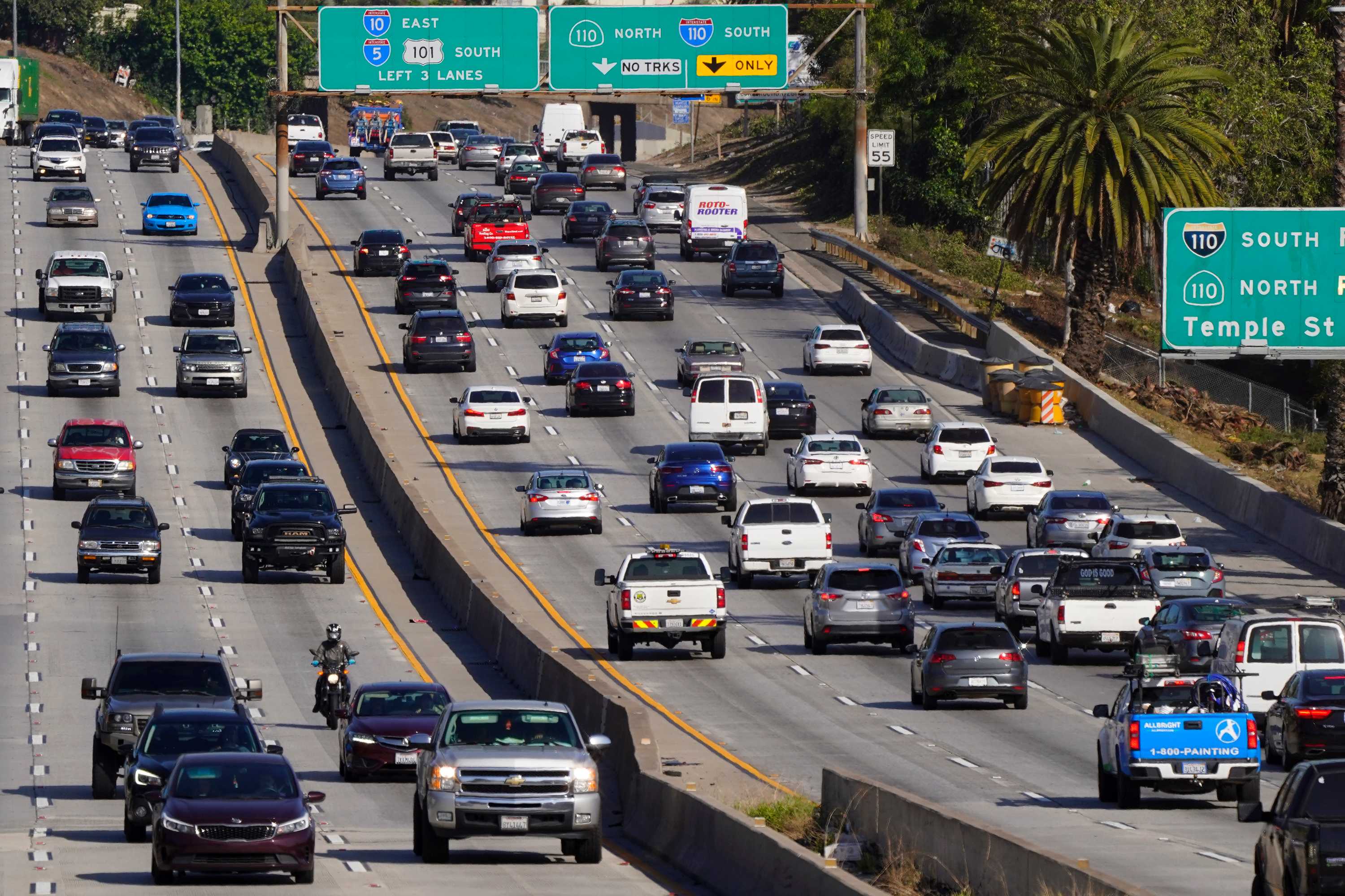 Cars are shown on a busy freeway