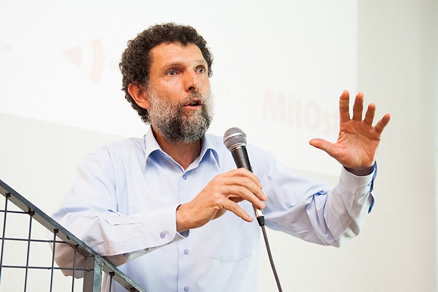 Turkish philanthropist Osman Kavala speaks during an event in Istanbul in this undated photo.
