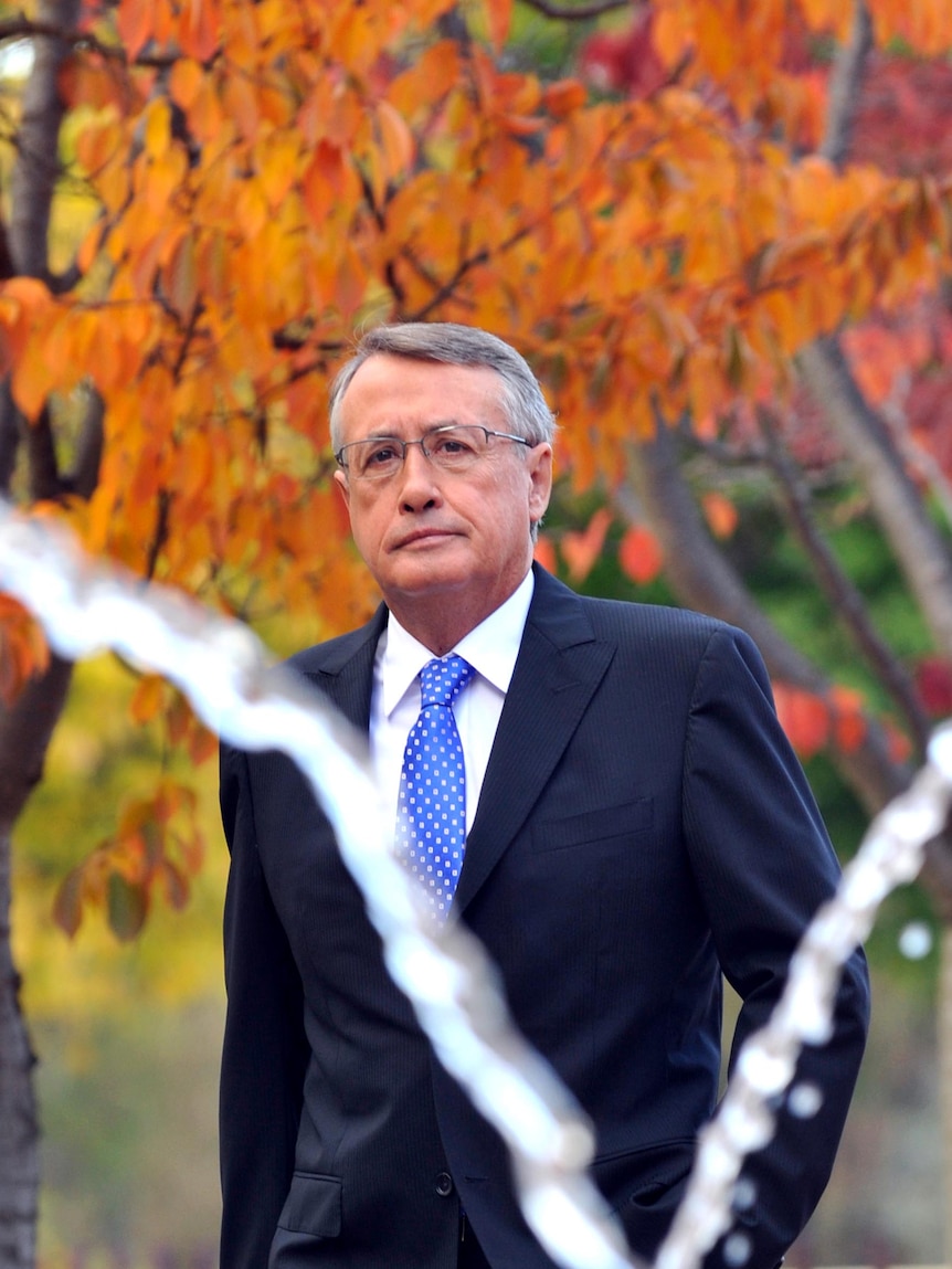 Treasurer Wayne Swan arrives at Parliament House in Canberra.