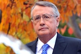 Treasurer Wayne Swan arrives at Parliament House in Canberra.