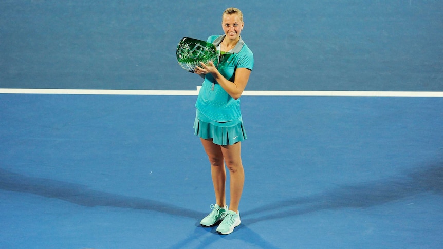 Kvitova celebrates with Sydney International trophy