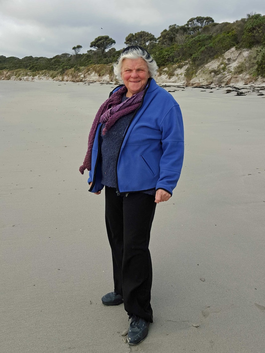 Jeanette Gibson on a beach