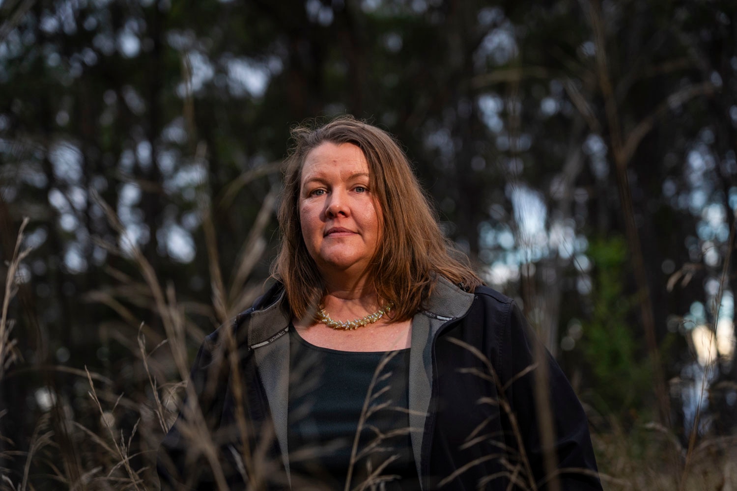 Rebecca Digney stands in the bush.
