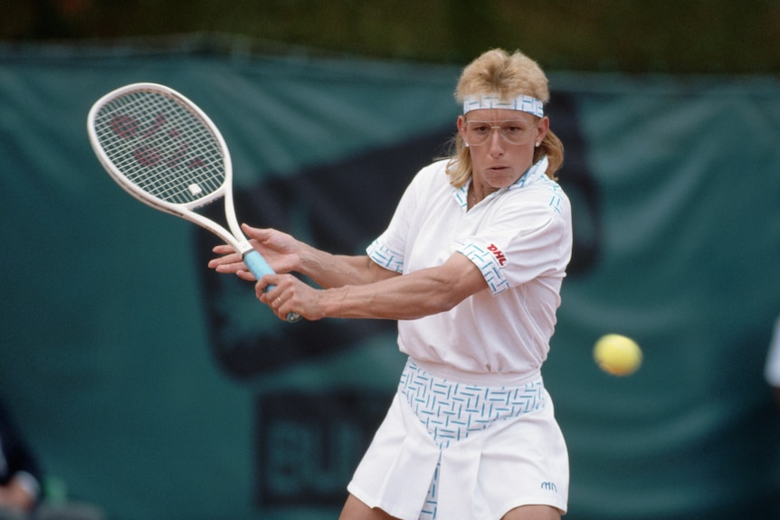 Martina Navratilova prepares to hit a slice backhand.