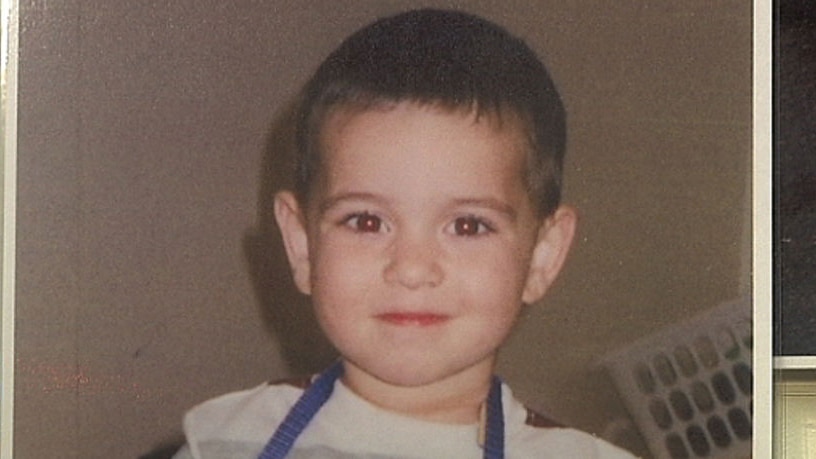 A toddler with short brown hair