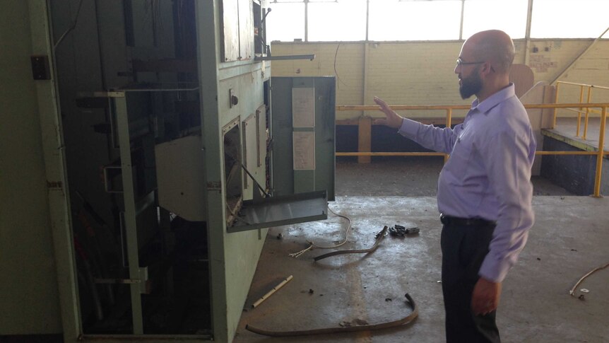 Muhammed Karouche inspects damage at proposed mosque site