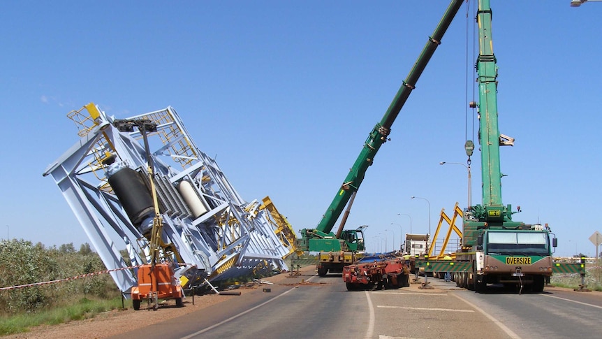 A steel structure lies on its side