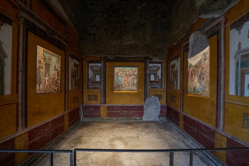 A view into a roman room with mosaics and paintings restored. 