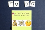 A sticky note with the words To Do above it and check your super account written on it.