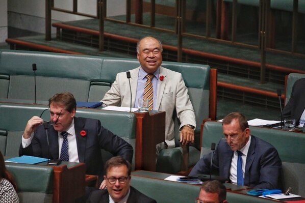 Ian Goodenough smiles from the back bench during Question Time.