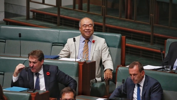 Ian Goodenough smiles from the back bench during Question Time.