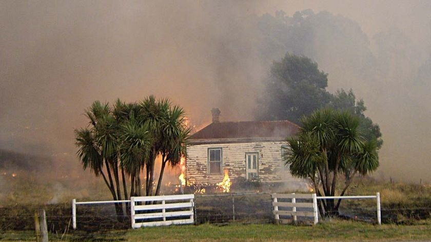 Smoke rises from a bushfire in Boolarra in Victoria's Gippsland region on January 31, 2009.