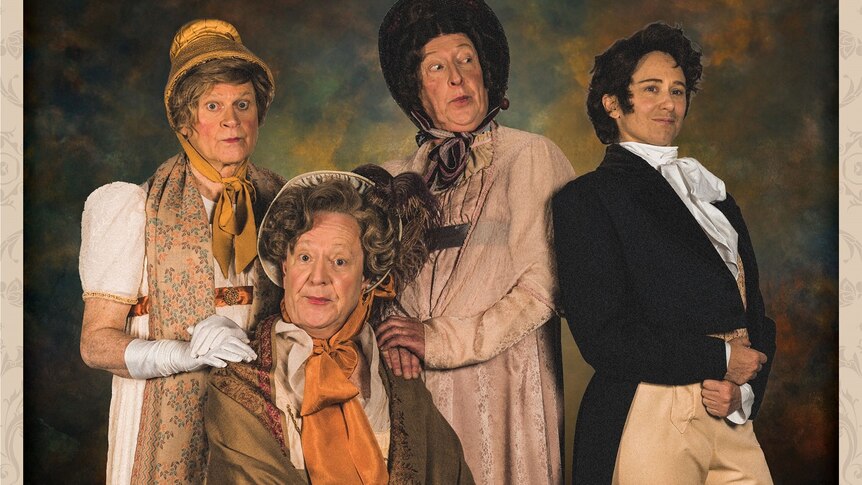 Four men and women dressed in period costume pull comical faces for the camera. 