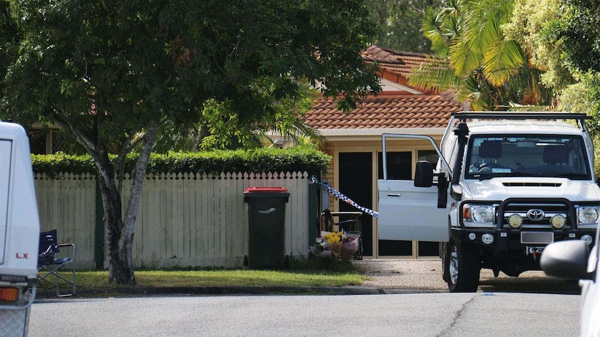 Police vehicles and crime scene tape at a home at Narangba, north of Brisbane.