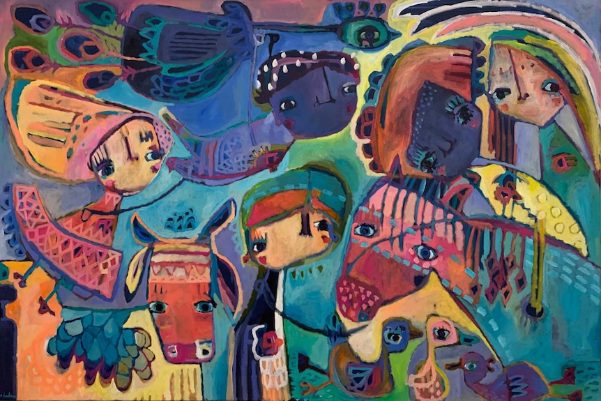 A colourful painting of kids and animals hangs on a wall