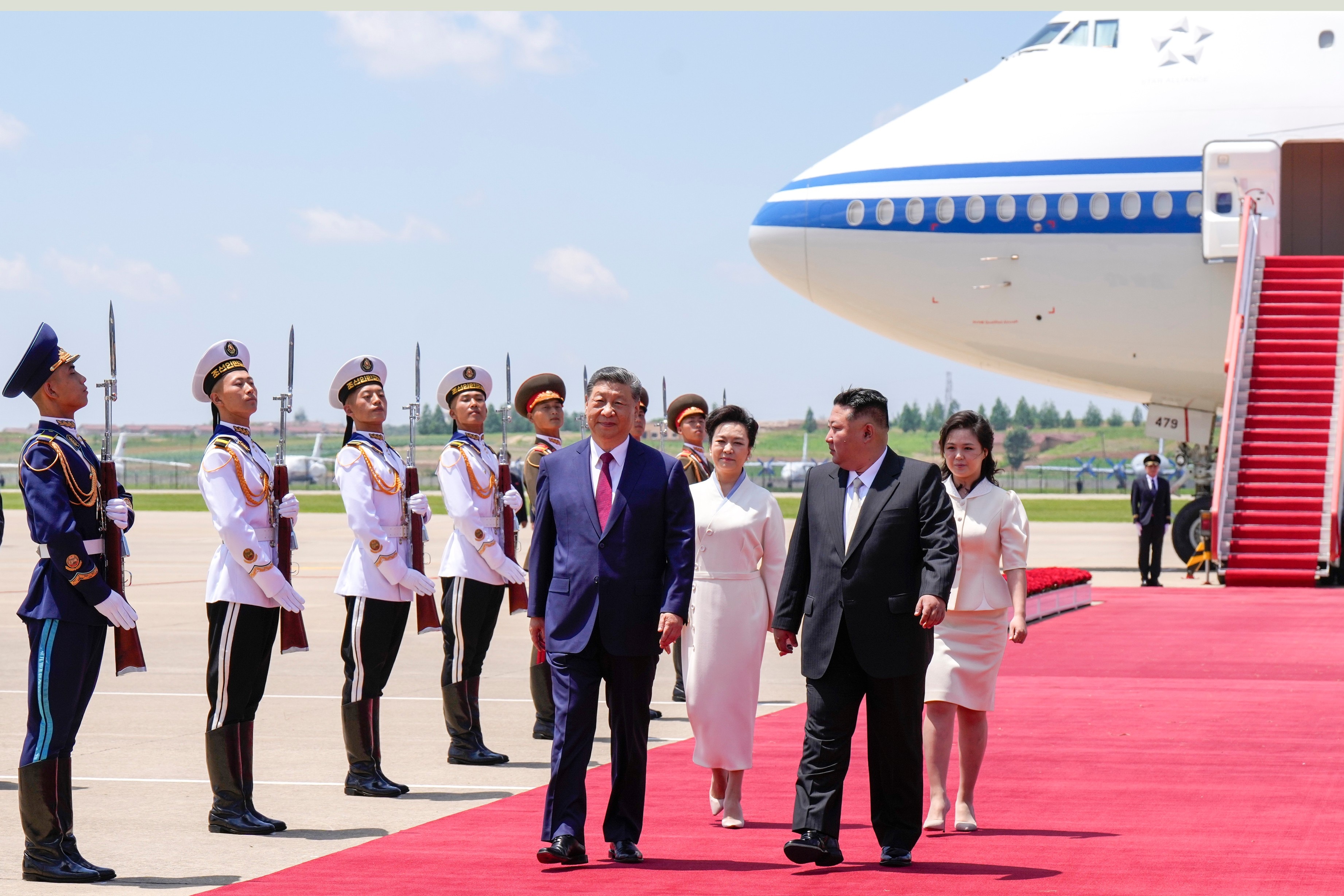 Why is China's Xi in North Korea?