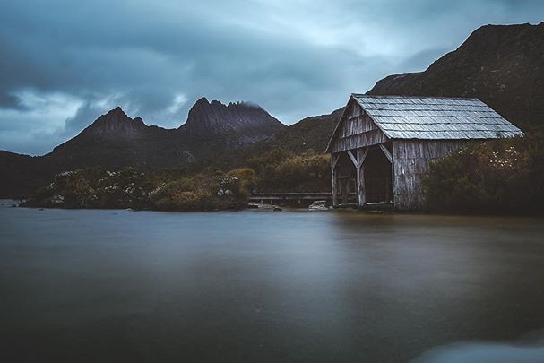 The wooden boat shed at the edge of Dove Lake.
