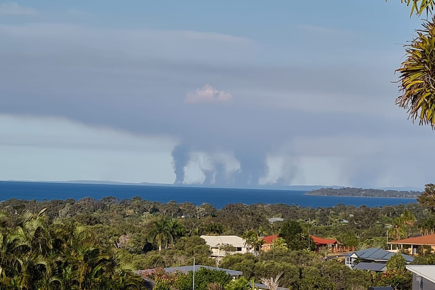 A bushfire on Fraser Island visible from Hervey Bay on the mainland