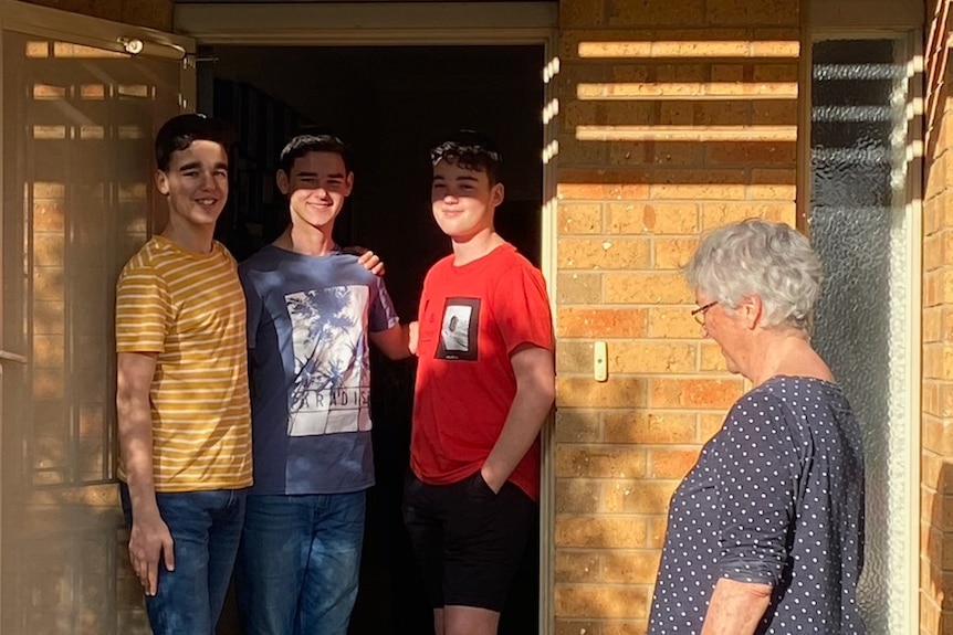 Cynthia Boddington and her three grandchildren, keeping a safe social distance.