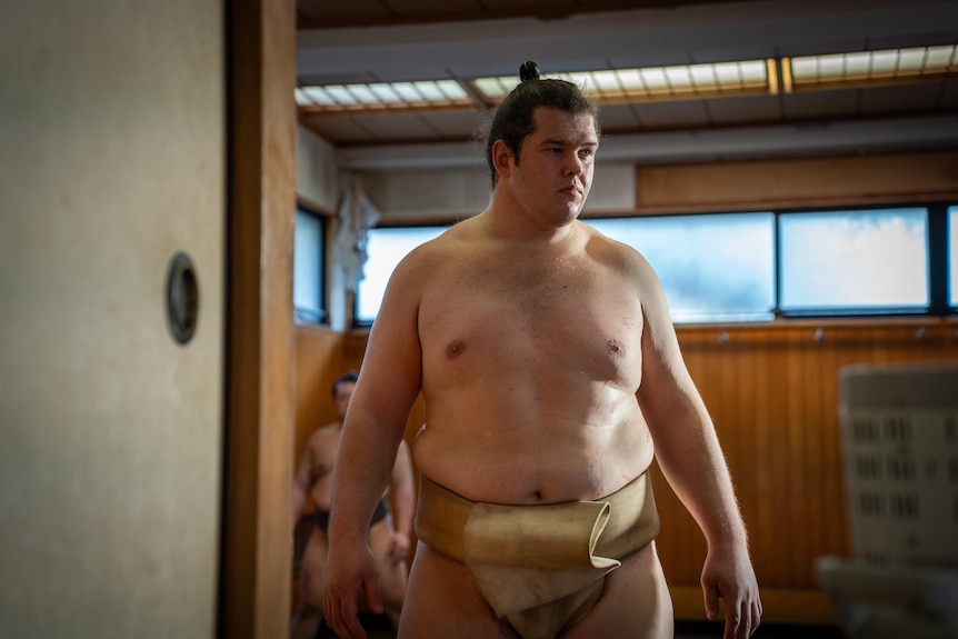 A man in a sumo outfit 