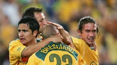 The Socceroos celebrate the opening goal against Uruguay in the World Cup qualifying match in Sydney