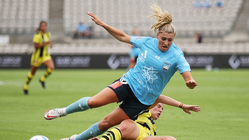 Remy Siemsen is tackled in A-League Women