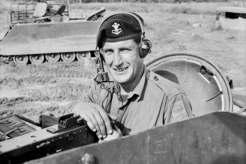 A soldier in a M113A1 APC - the work horses of the Vietnam war.