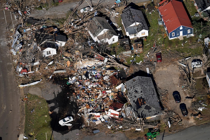 Destroyed homes are seen from the air in the aftermath of tornadoes