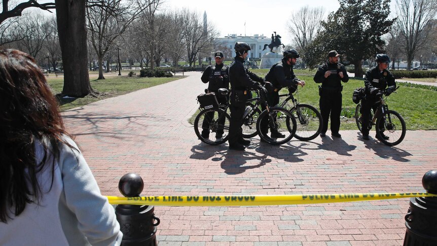 US Secret Service officers stand in Lafayette Park.