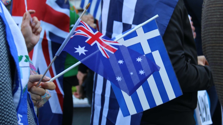 A Greece and Australian flag held together