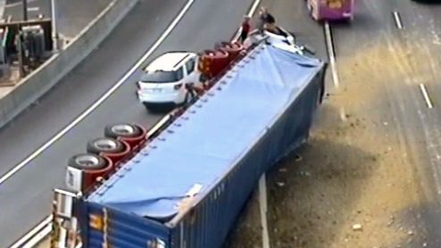 A truck on its side on the Bolte Bridge in Melbourne.