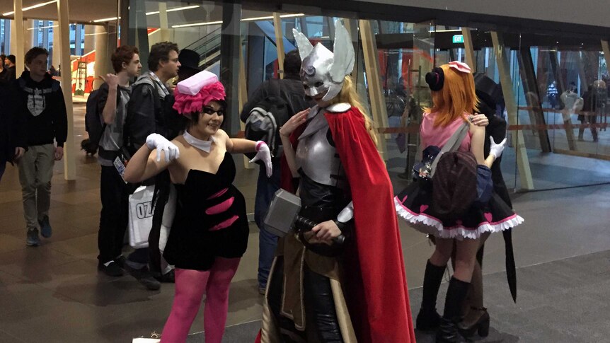 An odd coupling of Callie from Nintendo game Splatoon and Nordic god Thor.