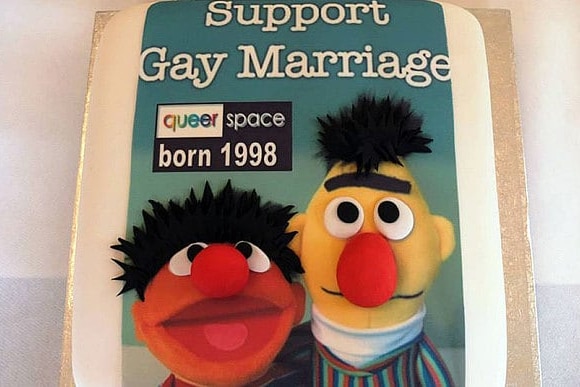 An image of the cake, featuring Sesame Street characters Bert and Ernie, which was baked by another business.