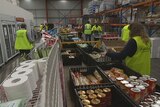 Foodbank workers packing food for the poor