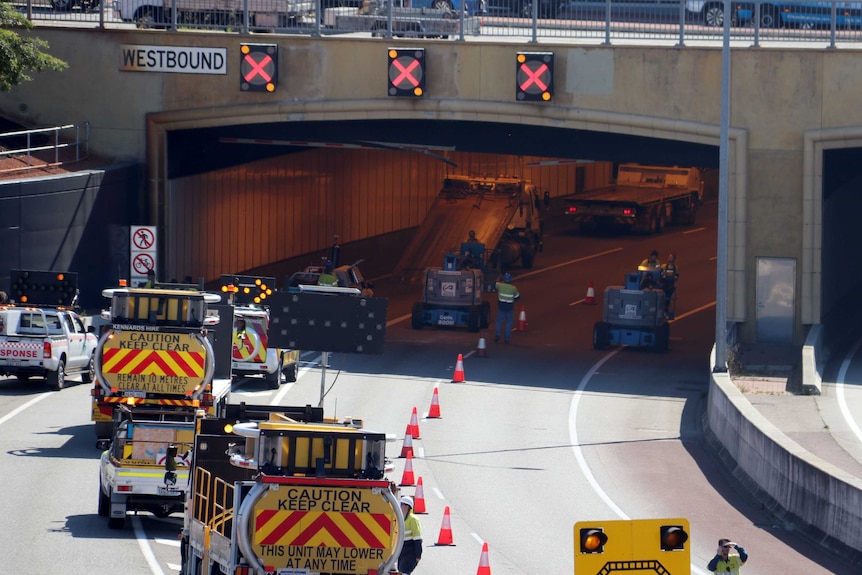 Workers and machinery near the entrance of the Northbridge Tunnel as repairs are carried out.