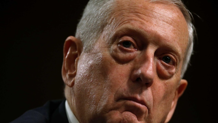 A close up of General James Mattis testifying before the committee