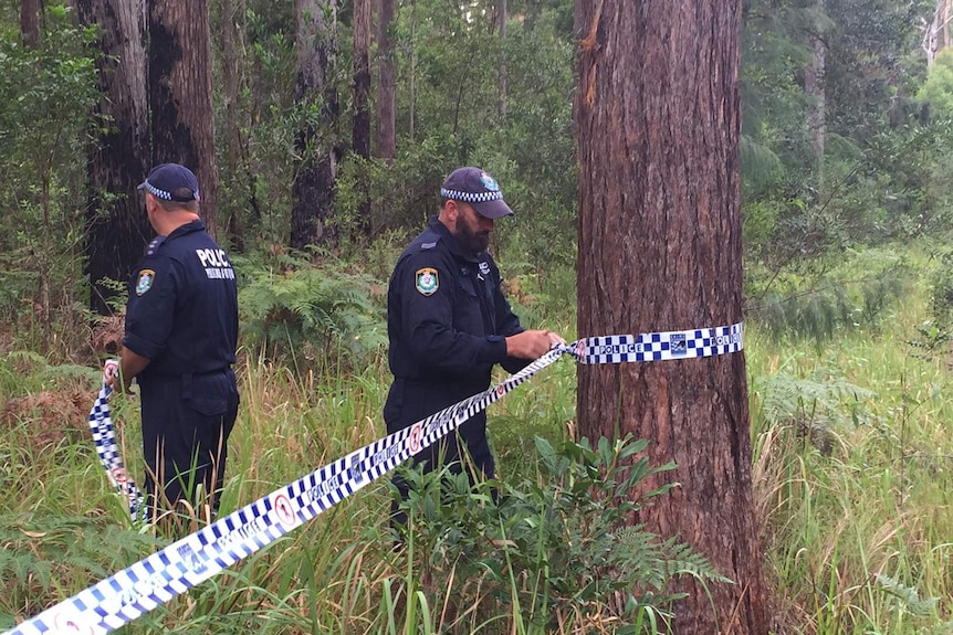 Police set up tape around the search area for William Tyrell in Bonny Hills