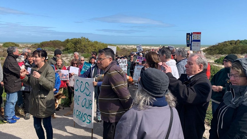 Protesters at the Semaphore sand dunes in coastal Adelaide.