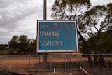 A faded scoreboard sign at the Ivanhoe Oval