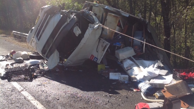 A furniture truck and a car have collided on the Pacific Highway near Kempsey on the NSW mid north coast.