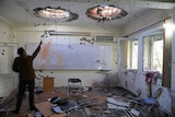 A Kabul University room pock marked by bullet holes.