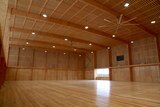 Interior of a large recreation centre with every surface, wall, floor and ceiling constructed out of wood