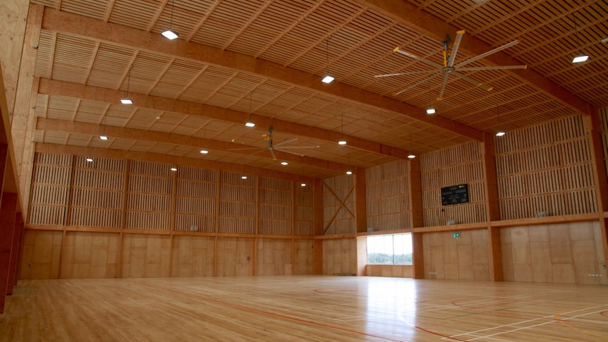 Interior of a large recreation centre with every surface, wall, floor and ceiling constructed out of wood