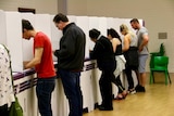 Voters at polling booths in Canberra.