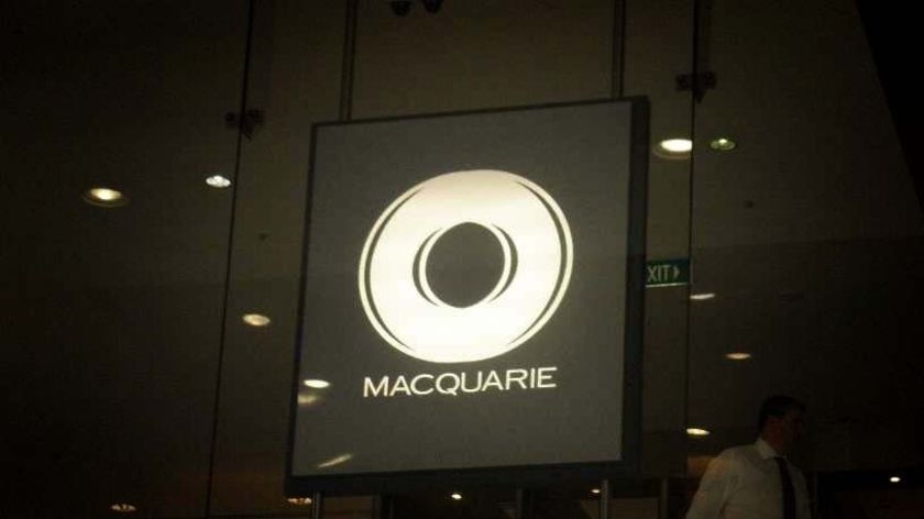 A Macquarie Bank sign sits in the window of one of the bank's Sydney offices