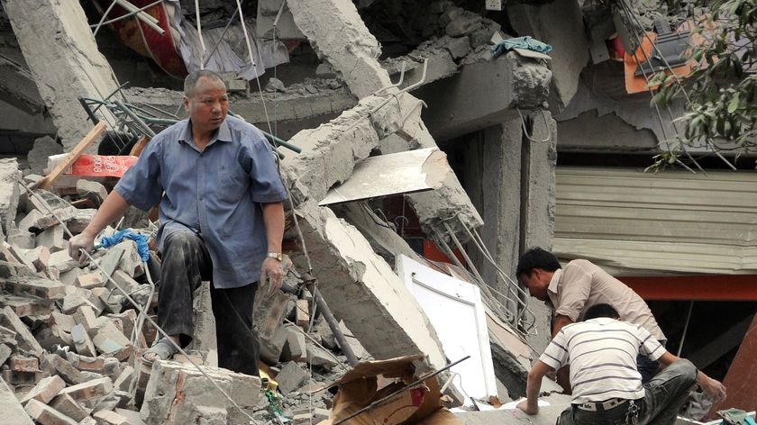 Rescuers search rubble for survivors