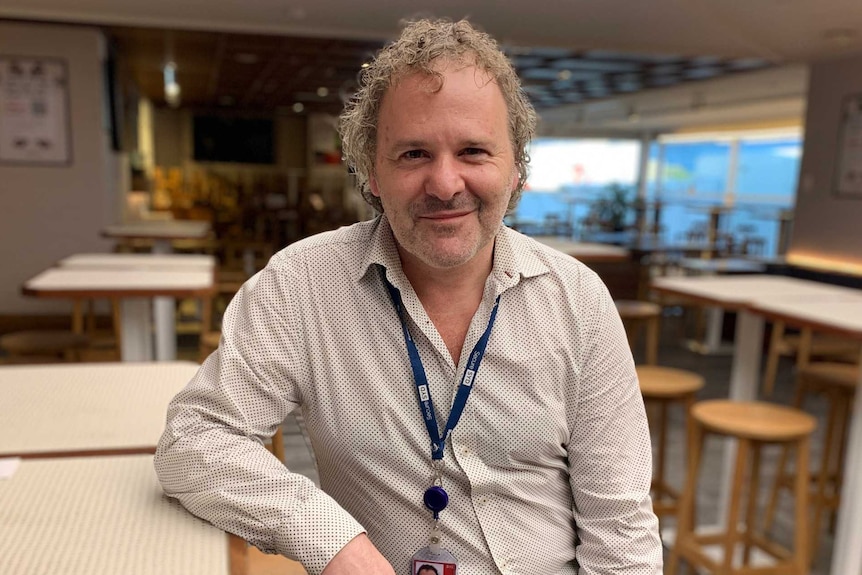 Photo of bar owner Mark Nixon at Sydney airport.