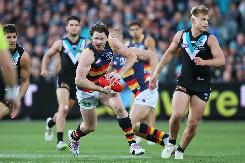 Adelaide's Patrick Dangerfield finds space to run the ball against Port Adelaide on July 19, 2015.