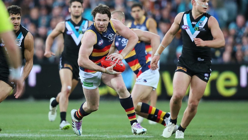 Patrick Dangerfield on the ball for Adelaide in Showdown XXXIX against Port Adelaide